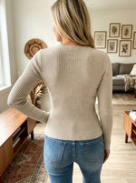 Women Oat Twist Cutout Metal Ring Ribbed Slim Fit Long Sleeve Knit Top